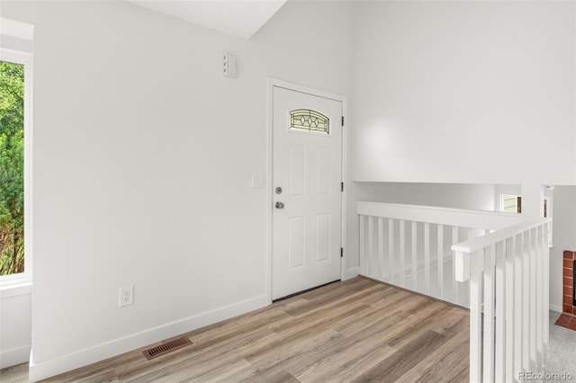 2777 S Sedalia St, Aurora, CO 80013 - foyer featuring wood finished floors and lofted ceiling