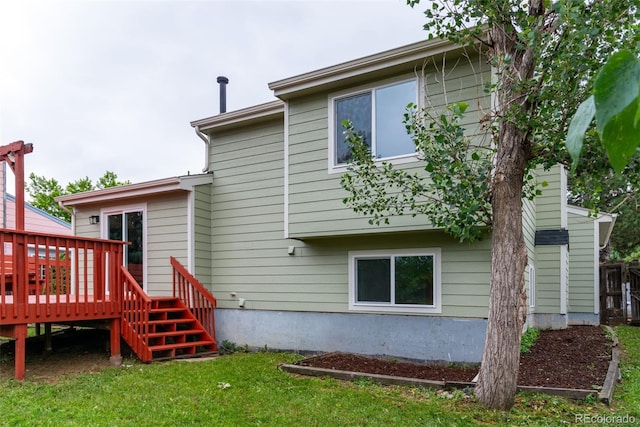 2777 S Sedalia St, Aurora, CO 80013 - rear view of house featuring a deck, a yard, and stairs