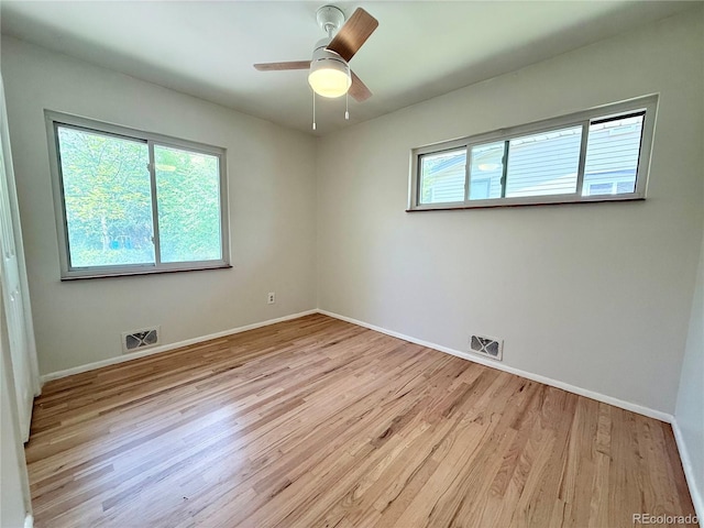 4425 E Harvard Ave, Denver, CO 80222 - empty room with wood finished floors, baseboards, and ceiling fan