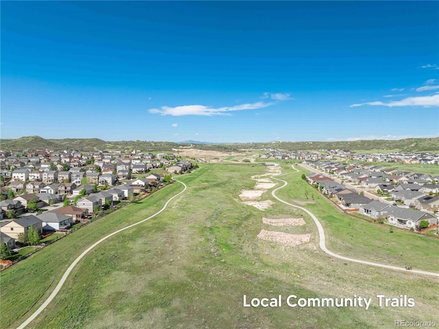 7686 Grady Cir, Castle Rock, CO 80108 - aerial view of property and surrounding area featuring nearby suburban area and a mountainous background