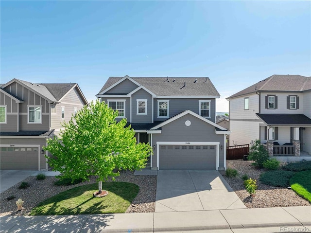 7686 Grady Cir, Castle Rock, CO 80108 - view of front of house featuring driveway, a shingled roof, a residential view, and an attached garage