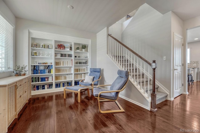 7686 Grady Cir, Castle Rock, CO 80108 - living area featuring wood finished floors, stairway, and baseboards