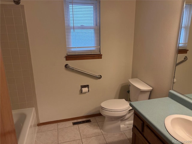 14963 E Adriatic Pl, Aurora, CO 80014 - full bathroom with tile patterned floors, vanity, and  shower combination