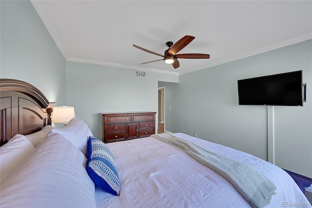 bedroom featuring ornamental molding and ceiling fan