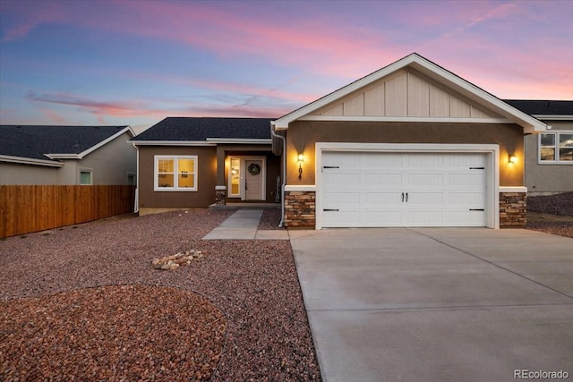 view of front of property with a garage