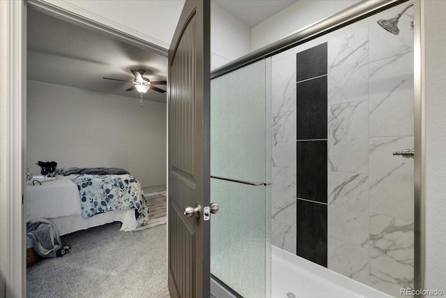 bathroom with ceiling fan and a shower with shower door