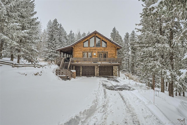 log cabin with a deck