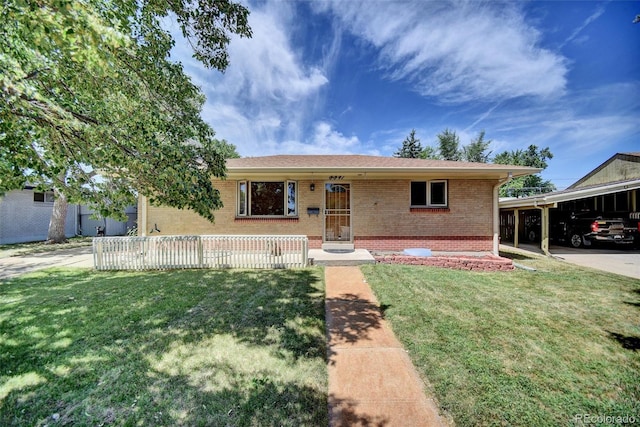 8841 Hunter Way, Westminster, CO 80031 - ranch-style house featuring brick siding, a front yard, and a carport