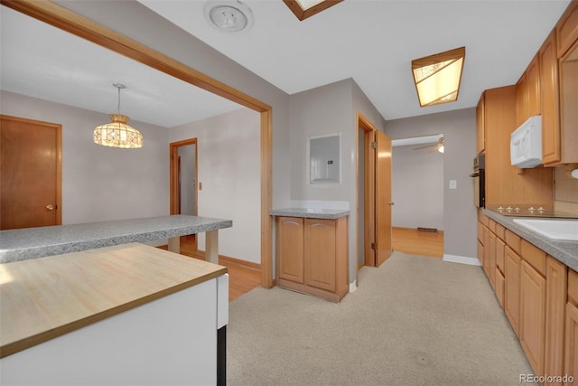 8841 Hunter Way, Westminster, CO 80031 - kitchen featuring white microwave, oven, electric panel, pendant lighting, and light colored carpet