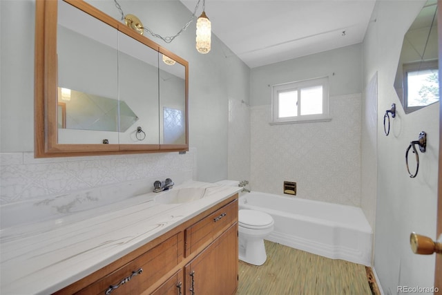 8841 Hunter Way, Westminster, CO 80031 - bathroom with vanity, wood finished floors, and shower / bathtub combination