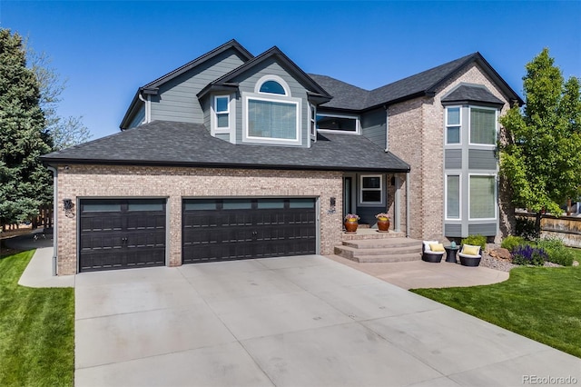 7067 Gray Fox Ct, Highlands Ranch, CO 80130 - view of front of property with driveway, brick siding, roof with shingles, and a front lawn