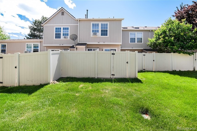 9713 W Chatfield Ave Unit F, Littleton, CO 80128 - view of yard featuring a gate