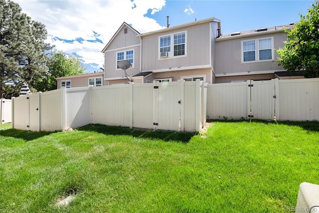 9713 W Chatfield Ave Unit F, Littleton, CO 80128 - back of property with a gate