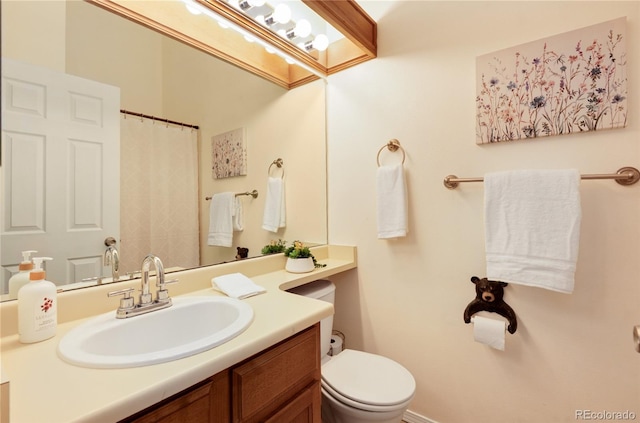9713 W Chatfield Ave Unit F, Littleton, CO 80128 - bathroom with toilet and vanity