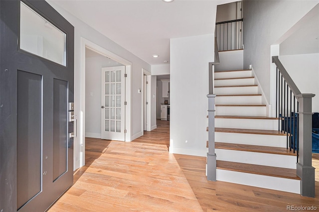 foyer entrance featuring light hardwood / wood-style flooring