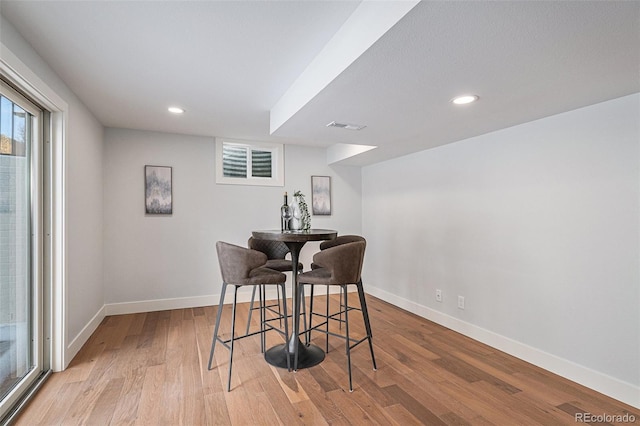 dining room featuring light hardwood / wood-style flooring