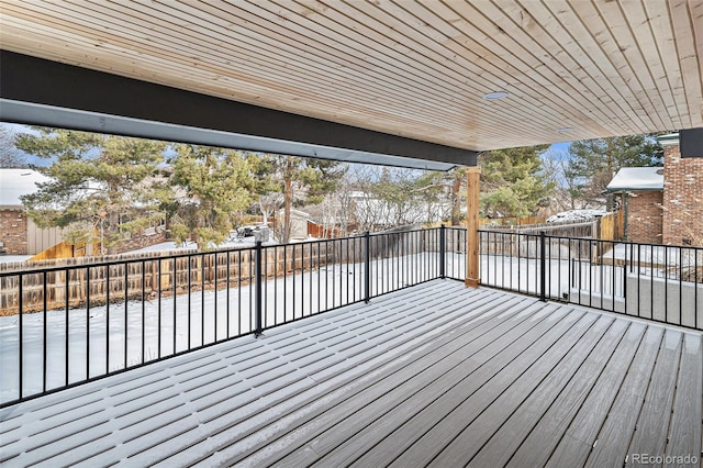 view of snow covered deck