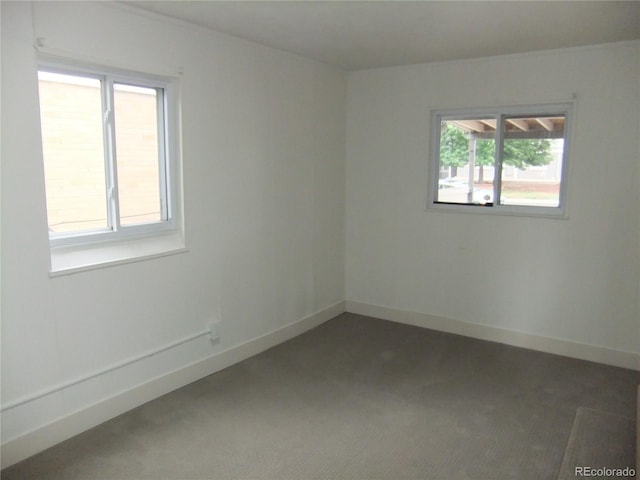 3243 Albion St, Denver, CO 80207 - empty room with carpet floors and baseboards