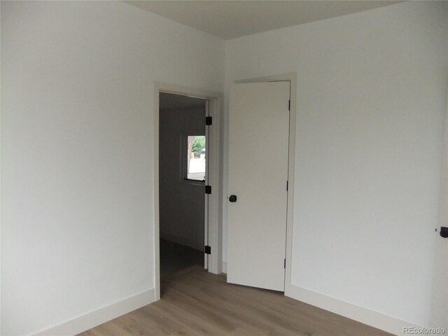 3243 Albion St, Denver, CO 80207 - empty room featuring light wood finished floors and baseboards