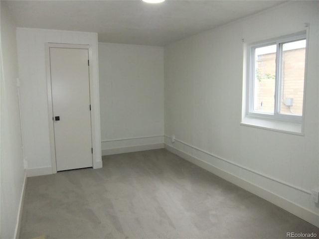 3243 Albion St, Denver, CO 80207 - unfurnished room featuring light colored carpet and baseboards