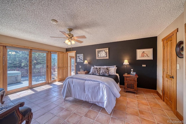 tiled bedroom featuring access to exterior, a textured ceiling, and ceiling fan