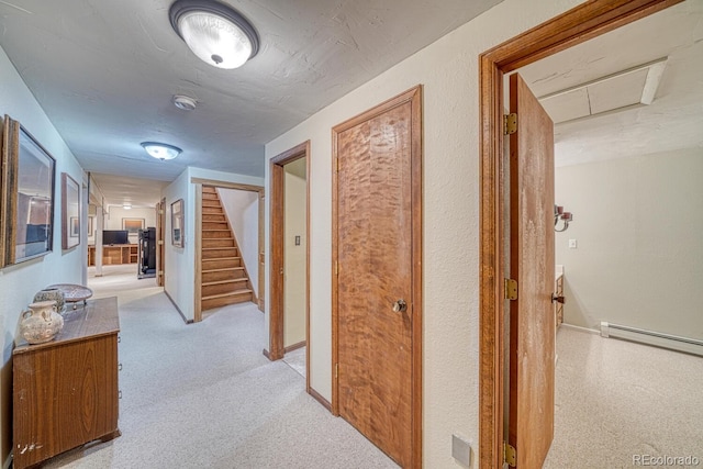 hallway with light colored carpet