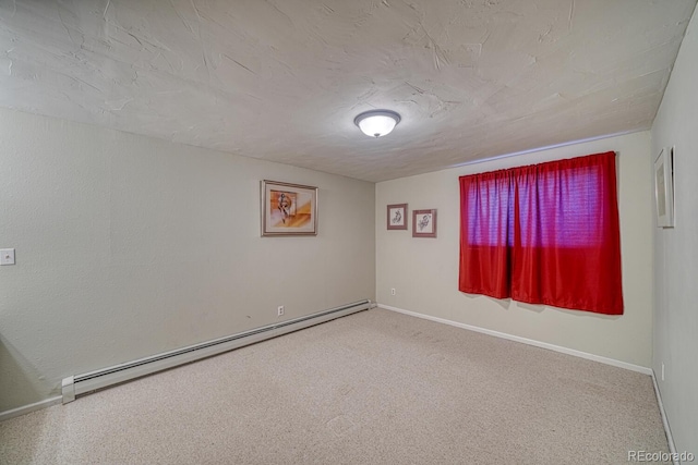 spare room featuring baseboard heating