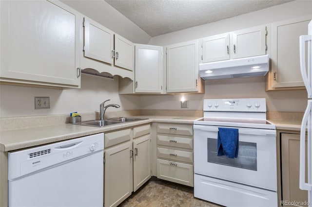 13606 E Bates Ave Unit 102, Aurora, CO 80014 - kitchen with white appliances, under cabinet range hood, light countertops, and a textured ceiling