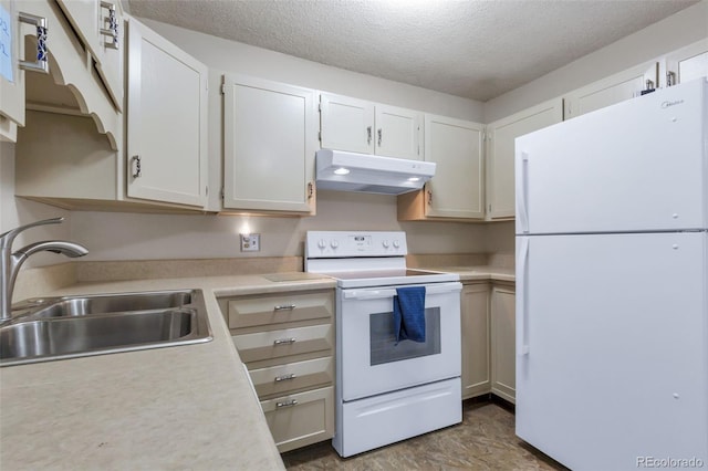 13606 E Bates Ave Unit 102, Aurora, CO 80014 - kitchen featuring white appliances, under cabinet range hood, light countertops, a textured ceiling, and white cabinetry