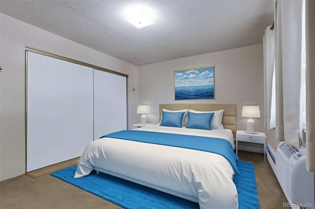 13606 E Bates Ave Unit 102, Aurora, CO 80014 - carpeted bedroom featuring a closet