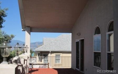 balcony featuring a mountain view