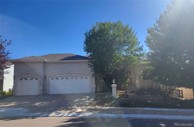 view of front of house with a garage