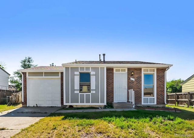 5112 Duluth Ct, Denver, CO 80239 - ranch-style house featuring driveway and brick siding