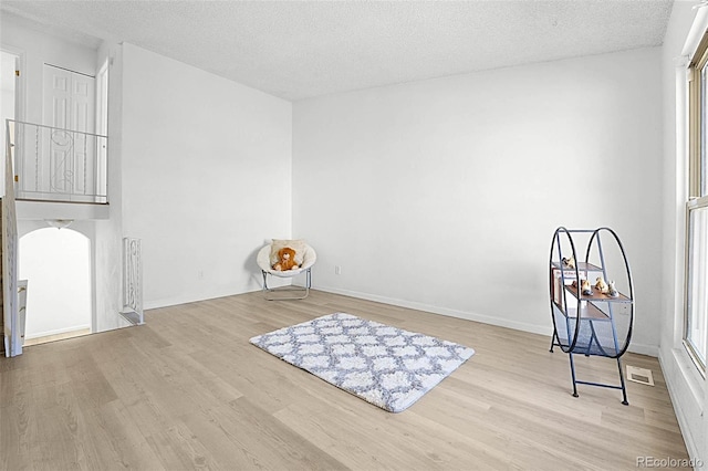 5112 Duluth Ct, Denver, CO 80239 - unfurnished room with wood finished floors and a textured ceiling