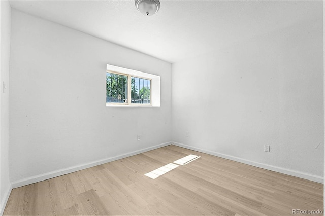 5112 Duluth Ct, Denver, CO 80239 - empty room featuring wood finished floors and baseboards