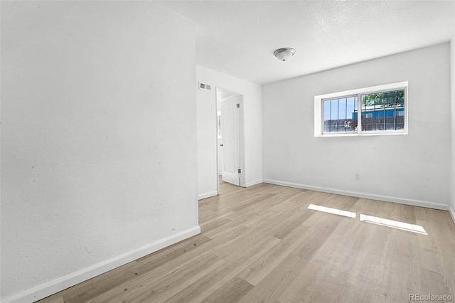 5112 Duluth Ct, Denver, CO 80239 - spare room featuring wood finished floors