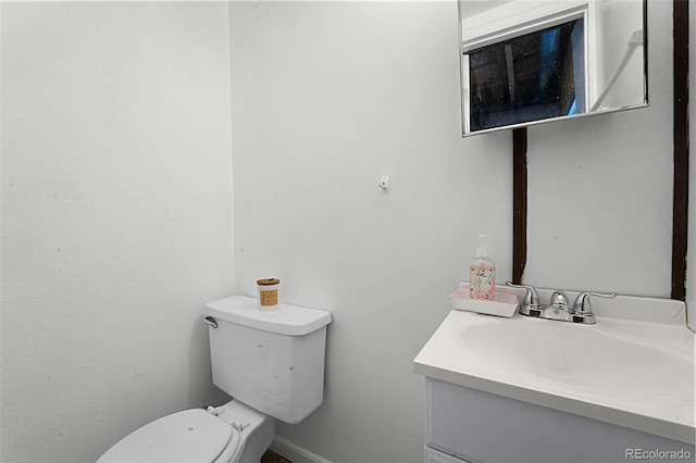 5112 Duluth Ct, Denver, CO 80239 - bathroom featuring vanity and toilet