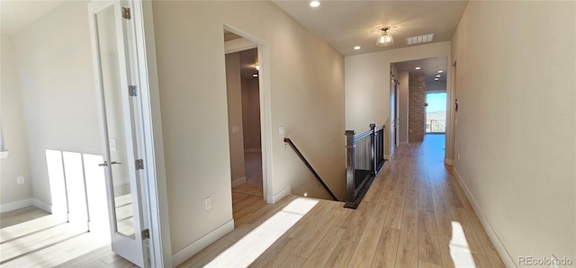 hallway featuring light hardwood / wood-style floors