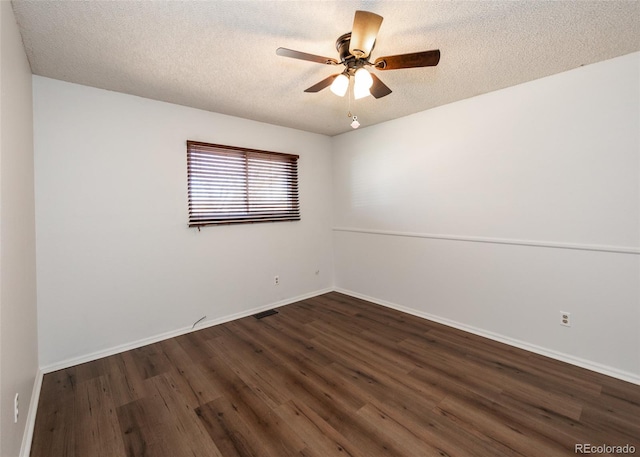 unfurnished room with a textured ceiling, ceiling fan, and dark hardwood / wood-style floors