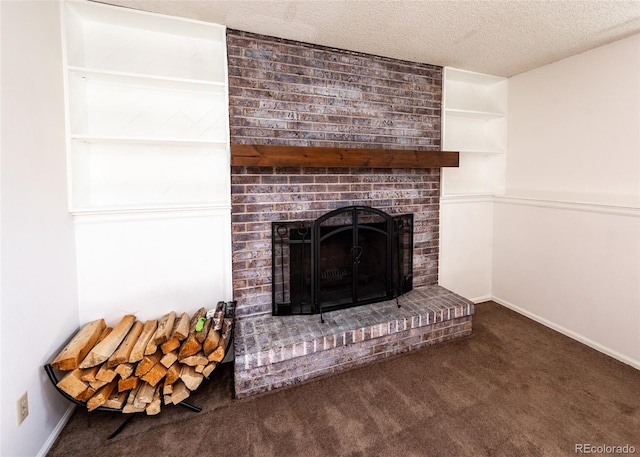 room details with a fireplace, carpet, and a textured ceiling