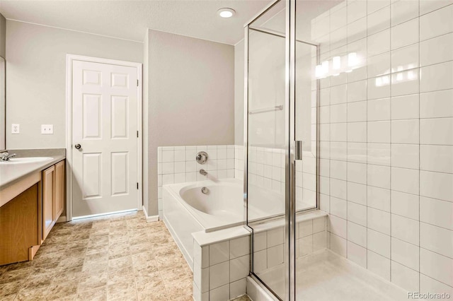 bathroom with vanity and plus walk in shower