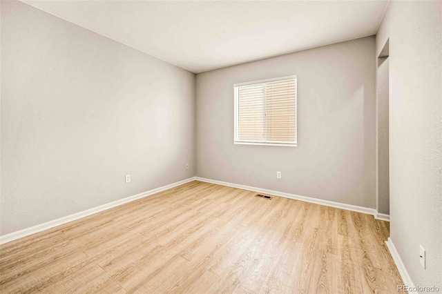 empty room featuring light hardwood / wood-style flooring