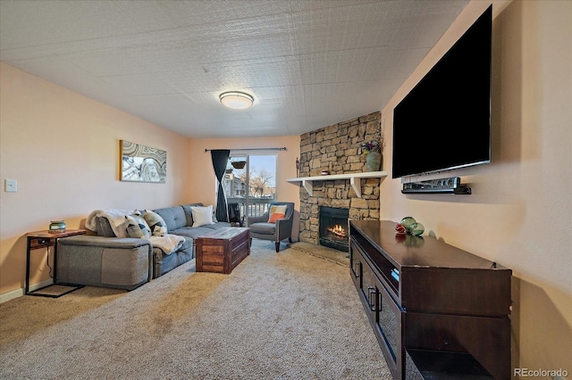 13393 E Asbury Dr Unit 103, Aurora, CO 80014 - carpeted living room with a stone fireplace