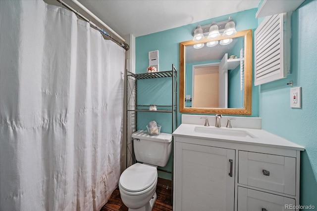 13393 E Asbury Dr Unit 103, Aurora, CO 80014 - bathroom featuring vanity, wood finished floors, and a shower with curtain
