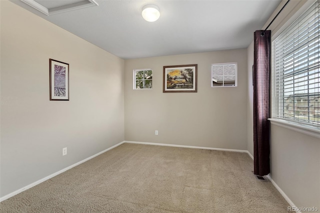 13415 Kearney St, Thornton, CO 80602 - empty room with carpet floors, baseboards, and attic access