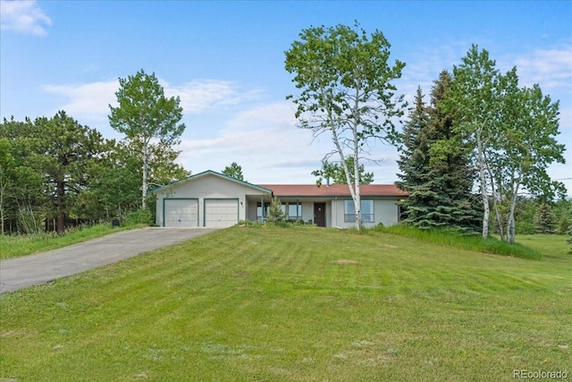 8427 S Custer Ln, Evergreen, CO 80439 - ranch-style house featuring a front lawn, a garage, and driveway
