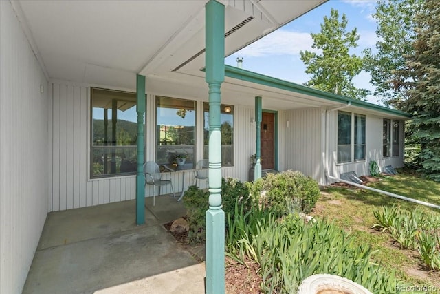 8427 S Custer Ln, Evergreen, CO 80439 - entrance to property featuring a porch