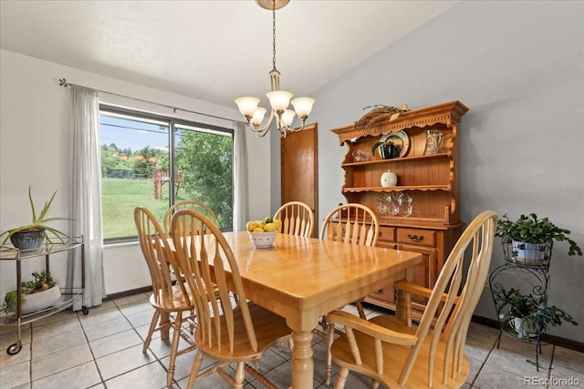 8427 S Custer Ln, Evergreen, CO 80439 - dining area with a chandelier and light tile patterned floors