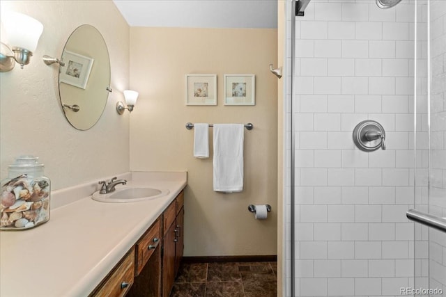 8427 S Custer Ln, Evergreen, CO 80439 - full bathroom with vanity and a tile shower