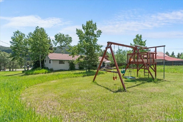 8427 S Custer Ln, Evergreen, CO 80439 - view of jungle gym featuring a yard